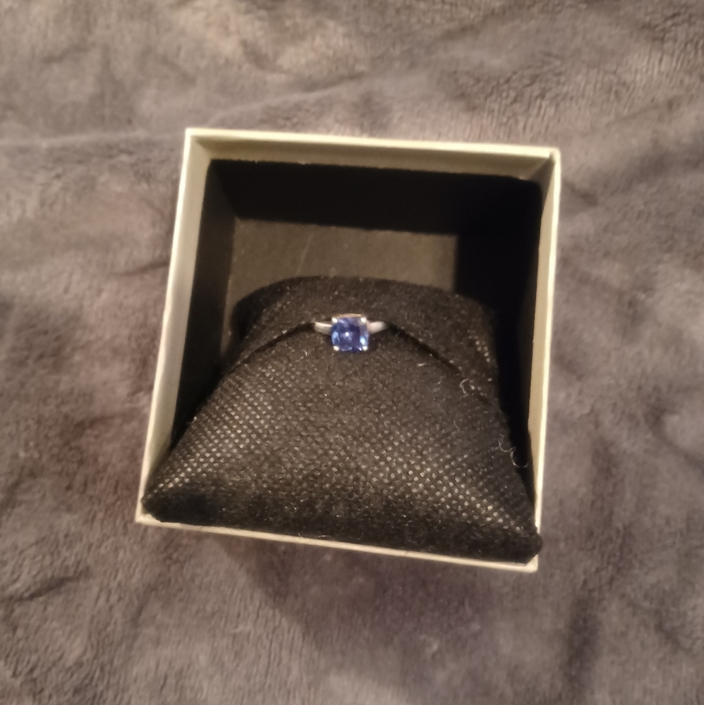 Sterling silver faux Sapphire ring. This is a beautiful blue. Size 6.